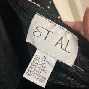 Black gold beaded cocktail dress. Low back.